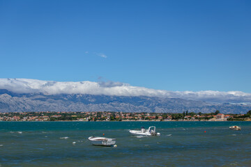 boats on the sea © talavietis