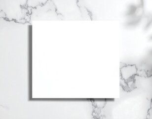 Blank white paper on marble