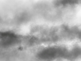Dark smoky cloud texture in black and white with soft misty background effect. Abstract foggy vapor haze for design, wallpaper, and digital art. Dramatic moody atmosphere texture.
