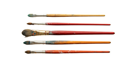 Five distinct used artist paintbrushes with dried paint and worn bristles, varying sizes and shapes, on a transparent background with soft studio light and copy space, concept of artistic