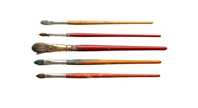 Five distinct used artist paintbrushes with dried paint and worn bristles, varying sizes and shapes, on a transparent background with soft studio light and copy space, concept of artistic