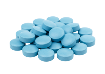 Light blue pills close up studio shot isolated on transparent background healthcare medical pharmaceutical concept