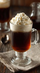 Coffee with whipped cream in clear glass
