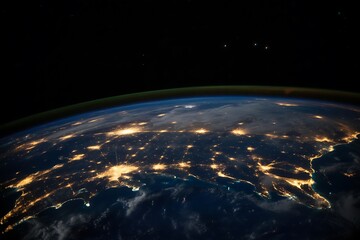 Obraz premium Stunning night view of the USA from space, showcasing cities illuminated against the dark expanse