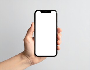 Hand Holding Blank Smartphone Display Against Gray Background.