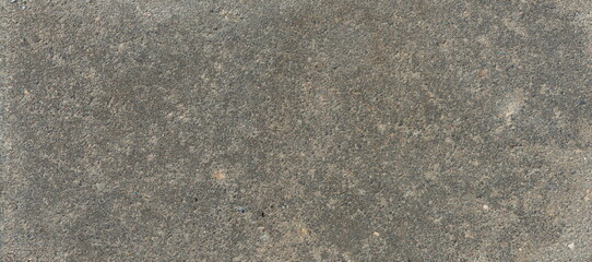 The texture of the brick is coarsely enlarged