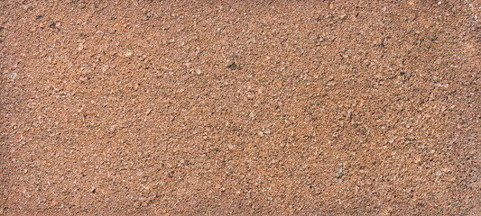 The texture of the brick is coarsely enlarged