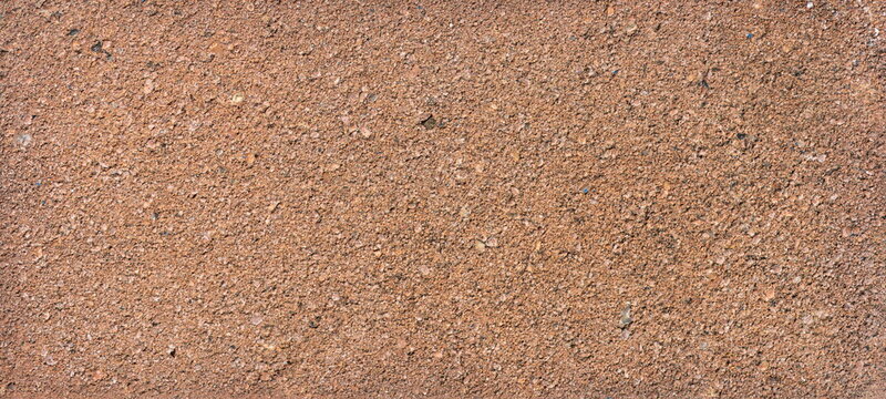 The texture of the brick is coarsely enlarged