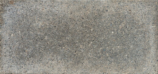 The texture of the brick is coarsely enlarged