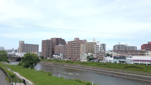June 28, 2025, Morioka, Iwate Prefecture, Japan.View of Morioka Station and Kaiun Bridge.