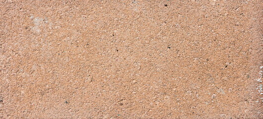 The texture of the brick is coarsely enlarged