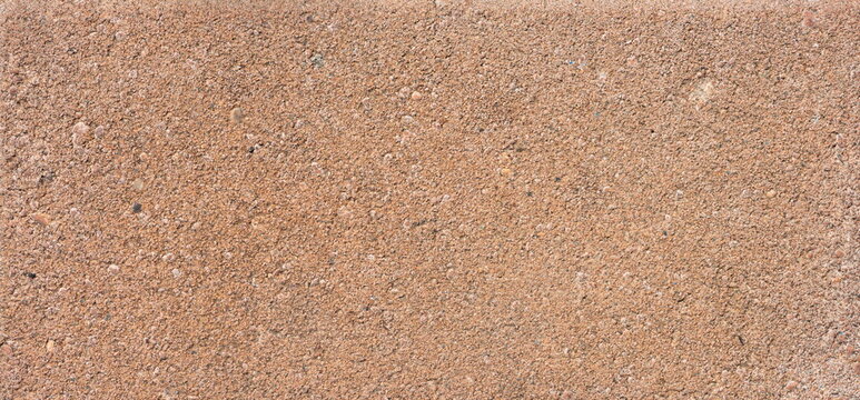 The texture of the brick is coarsely enlarged