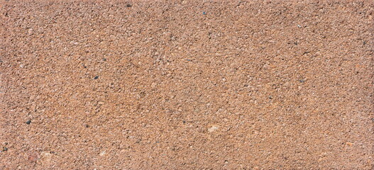 The texture of the brick is coarsely enlarged