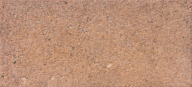 The texture of the brick is coarsely enlarged