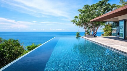 Fototapeta premium A five-star resort infinity pool overlooking the ocean