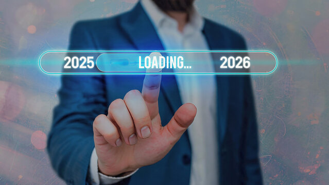 Close-up of businessman touching futuristic digital loading bar interface with neon blue years 2025–2026, glowing progress indicator, and high-tech professional atmosphere - Powered by Adobe