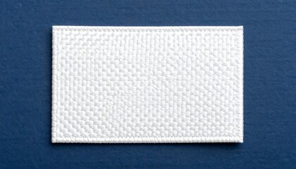White woven fabric swatch on a navy background.