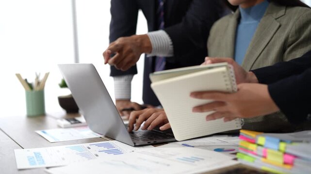 Close-up asia business people meeting plan analysis statistics brainstorm and header of team hold tablet pointing graph chart and employee take note. Finance strategy statistics success concept.