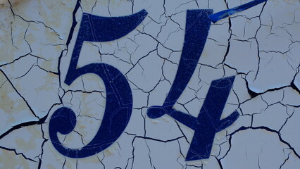 House number plate 54 close-up, Italy