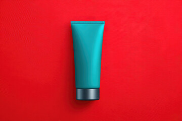 Stylish cosmetic tube on vibrant red background product photography studio environment close-up view beauty concept for marketing