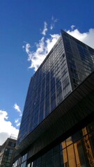 Modern skyscraper against a blue sky