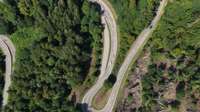 winding driving roads in the Schwarzwald Black Forest, Germany, emphasizing hairpin corners, mobility, scenic driving.
