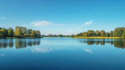 Obraz premium Serene Summer Lakeside: Where Mountains Mirror in Calm Blue Waters
