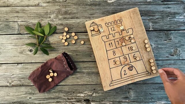 Captivating flat lay featuring a handcrafted wooden board game with a castle design.