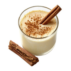 Glass of milk with cinnamon on top