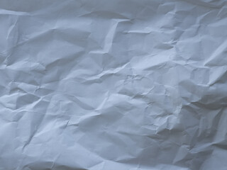 Macro texture of wrinkled white paper background