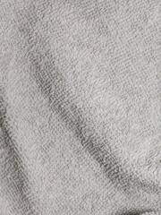 Close up macro texture of white cotton terry cloth fabric