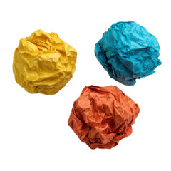 Three crumpled pieces of paper, one yellow, one orange, and one blue