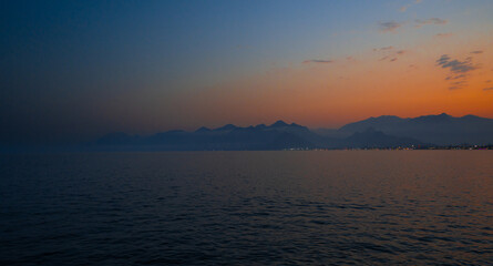 beautiful sunset in the mountains by the sea