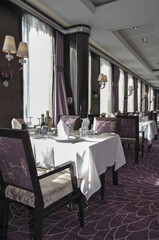 Formal and elegant a la carte ocean view dining room restaurant onboard luxury cruiseship or cruise...