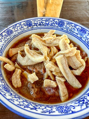 Delicious Bowl of Traditional Thai Curry with Crackling