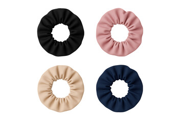 Obraz premium Four different colored fabric scrunchies for hair ties and fashion accessories isolated on a transparent background