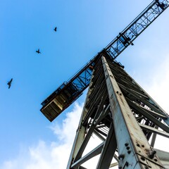 Construction crane against a clear blue sky