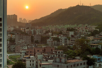 zhuhai china cityscape under an orange sunset