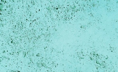 Türkisfarbene strukturierte Oberfläche als Hintergrundbild mit Platz für Text