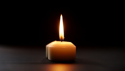 single burning candle in the dark hope faith remembrance religious spiritual