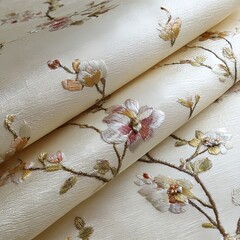 The embroidered cherry blossom pattern on the cream fabric is exquisite, with white flowers and green leaves. 