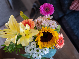 A vibrant bouquet of fresh flowers in a vase, symbolizing celebration and love, perfect for home decor