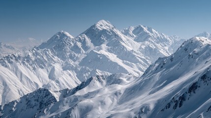 Obraz premium Snowy mountain range panorama, winter landscape, aerial view, clear sky, for travel posters