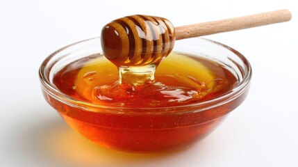Honey pot and dipper on white background.