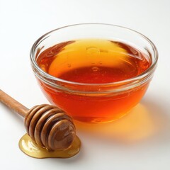 Honey pot and dipper on white background.