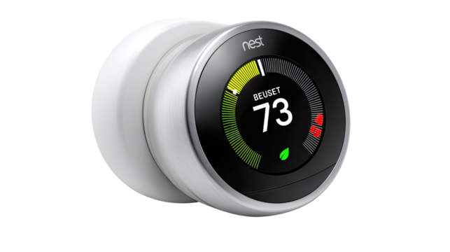 Smart Thermostat: A modern smart thermostat, featuring a sleek design, intelligently displays temperature readings, symbolizing technological advancements in home automation and energy efficiency.