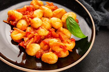 Gnocchi tomato sauce fresh delicious gourmet food background on the table  rustic food top view copy space