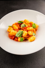 Gnocchi tomato sauce fresh delicious gourmet food background on the table  rustic food top view copy space