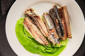 Sardine canned food sprats fish seafood fresh pescetarian diet gourmet food background on the table rustic food top view copy space keto and paleo diet