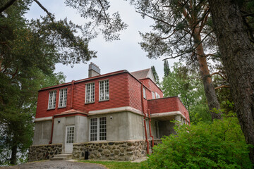 Architecture of a country house built in 1909 in a forest on the shore of Lake Ladoga in Karelia